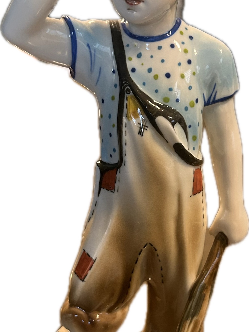 Hand-Painted porcelain Boy Figurine in White, Blue and Brown